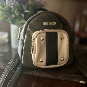 Steve Madden mini travel sized backpack, in color dark green and beige